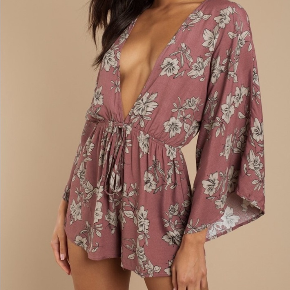 Size small romper. New w/tags